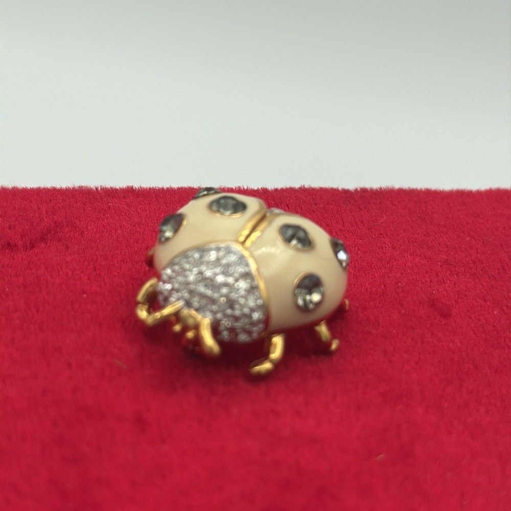 VTG Joan Rivers signed creamy white encrusted w/ Crystal rhinestones ladybug pin